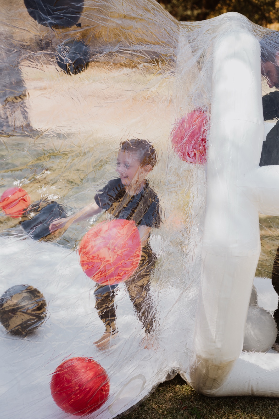 Children celebrating inside the bubble house